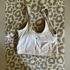 White Lululemon cropped tank top.